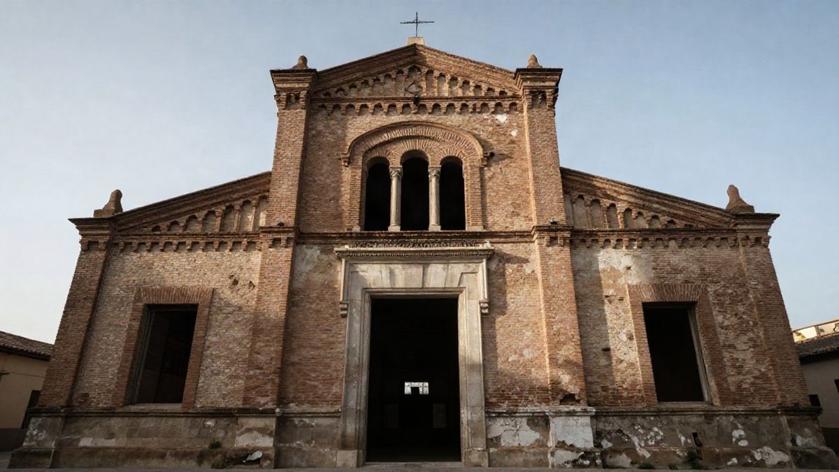 Imagen ilustrativa: ángulo bajo de un edificio histórico de ladrillo con cielo despejado al fondo